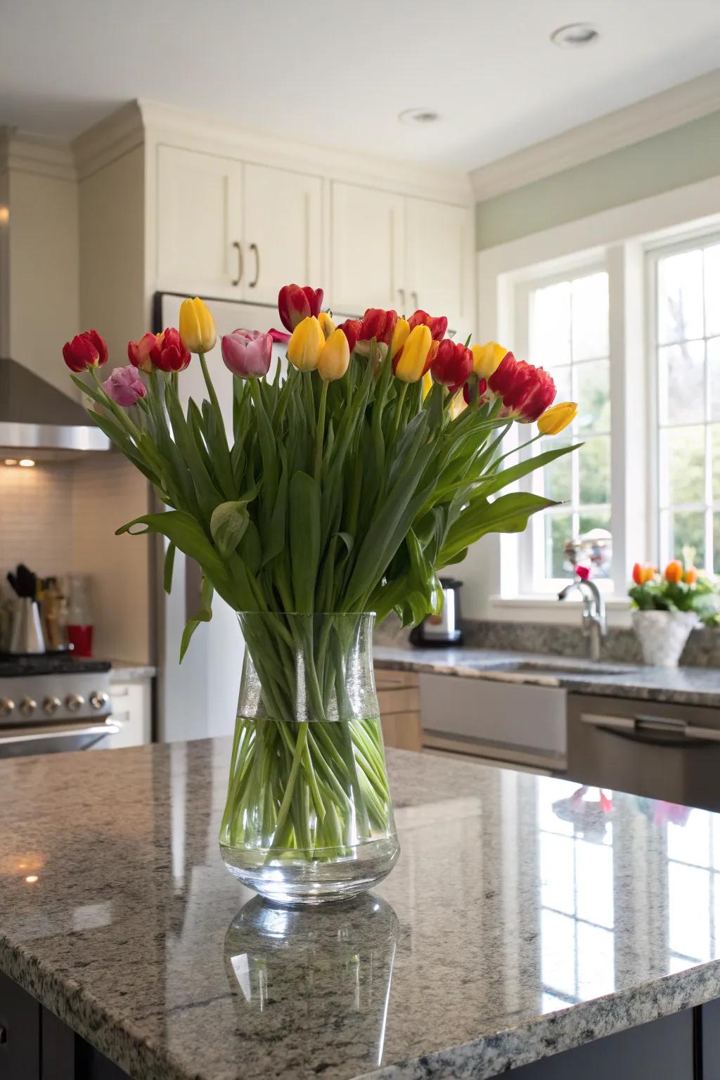 Elevate your kitchen island using a container of flowers of the season.