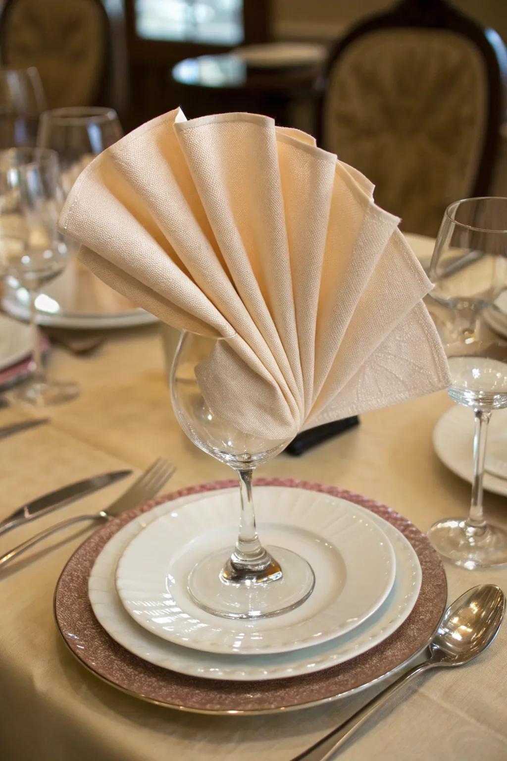 The traditional fan napkin fold is sublime for any elegant event.