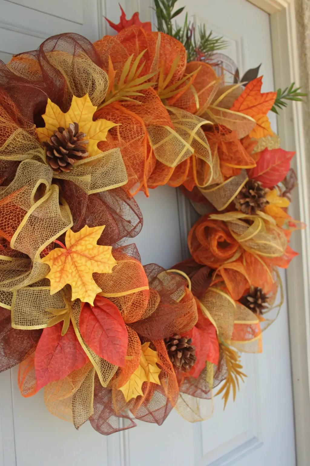 A classic autumn-colored wreath featuring woven embellishments and autumnal foliage.