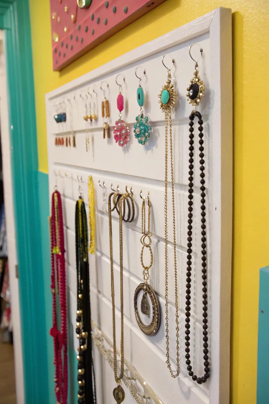 Show off your jewelry as a work of art using wall-mounted hooks.