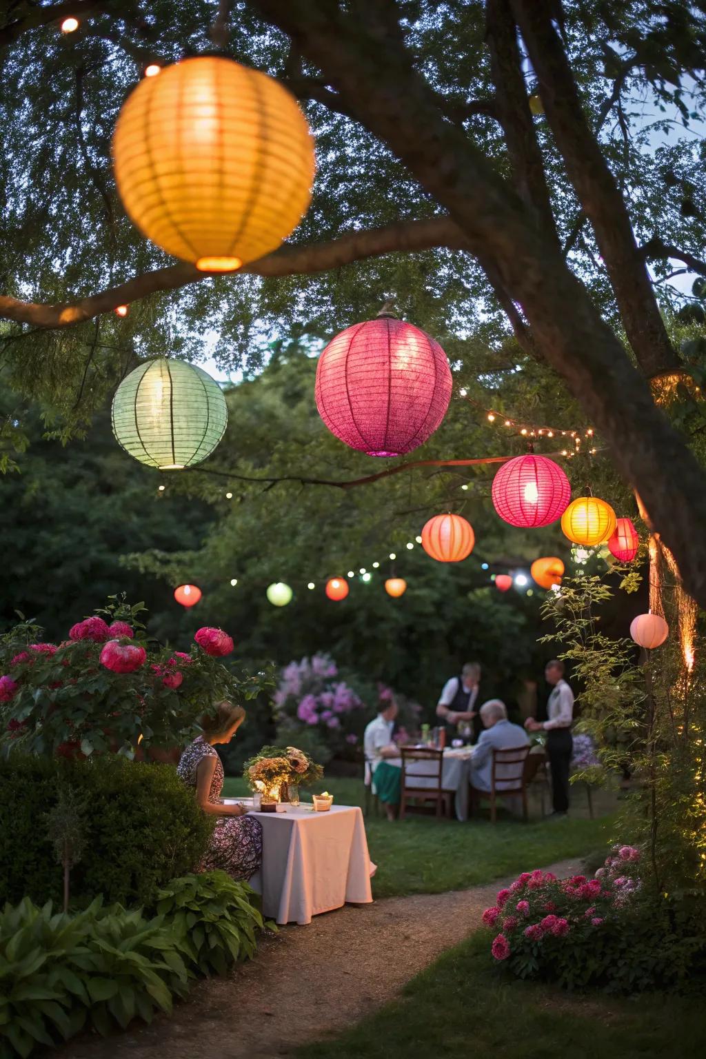 Radiant paper globes contribute a whimsical atmosphere to a garden celebration.
