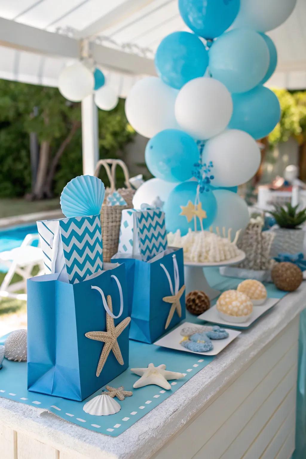 Party favor table featuring a coordinated color scheme and sea-inspired theme.