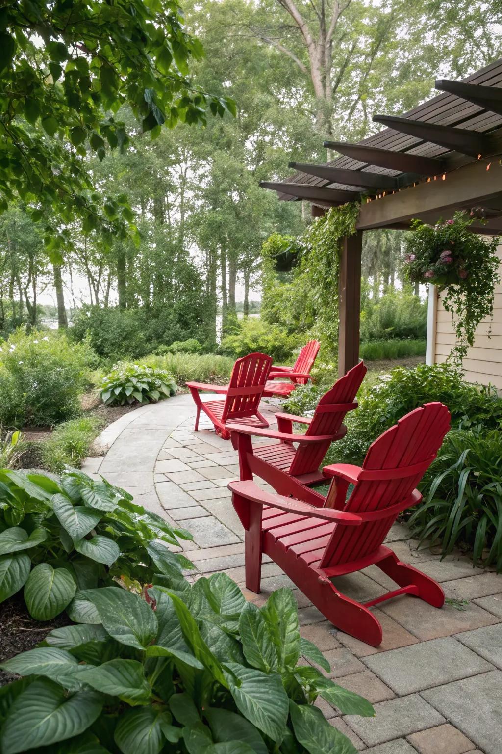 Scarlet Adirondack chairs pop beautifully against the lush greenery.