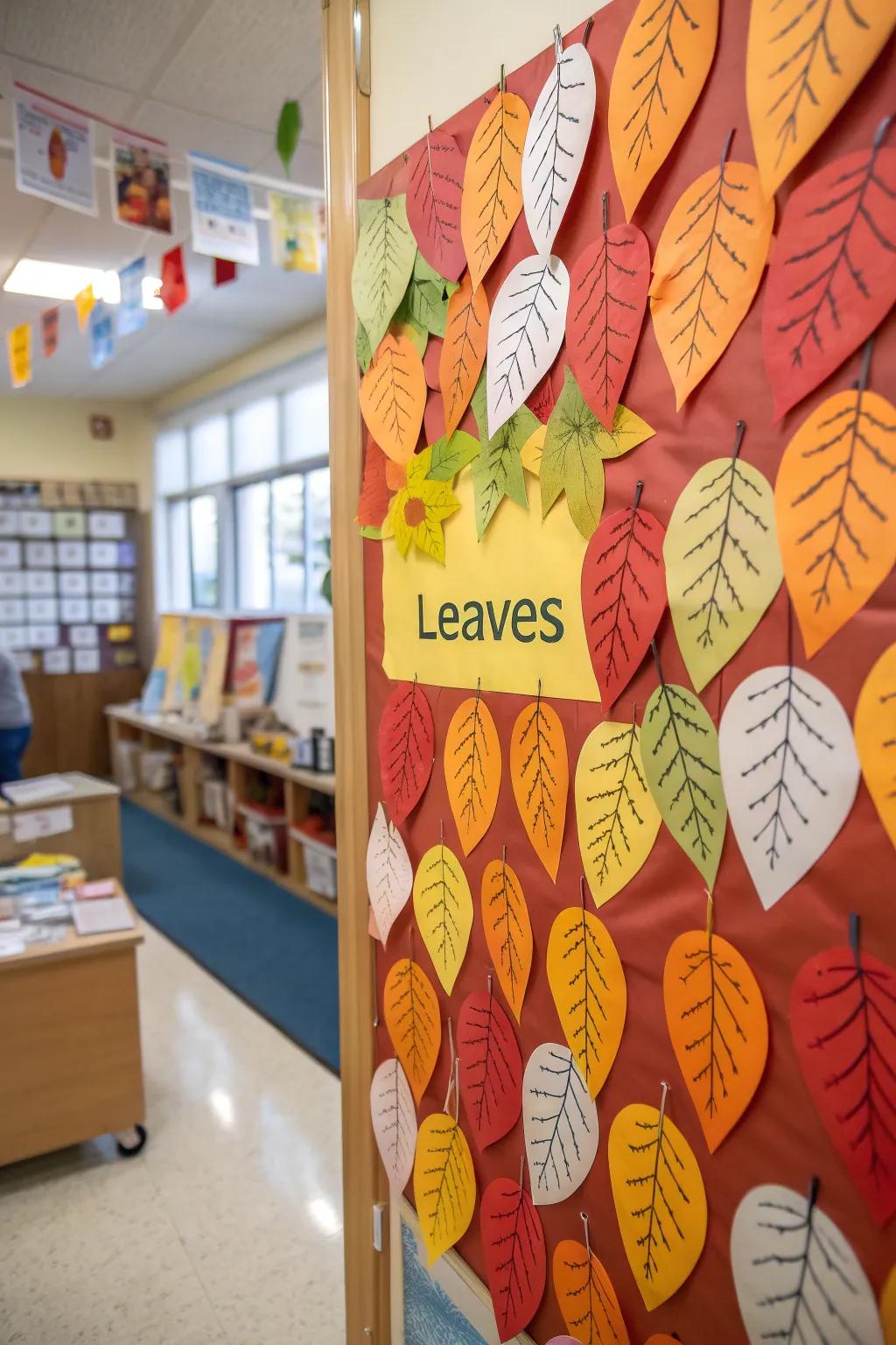 A preschool display board featuring children's names on paper leaves.