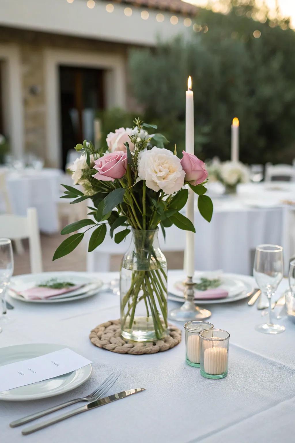 A minimalist vase holding peonies imparts sophistication to the table's design.