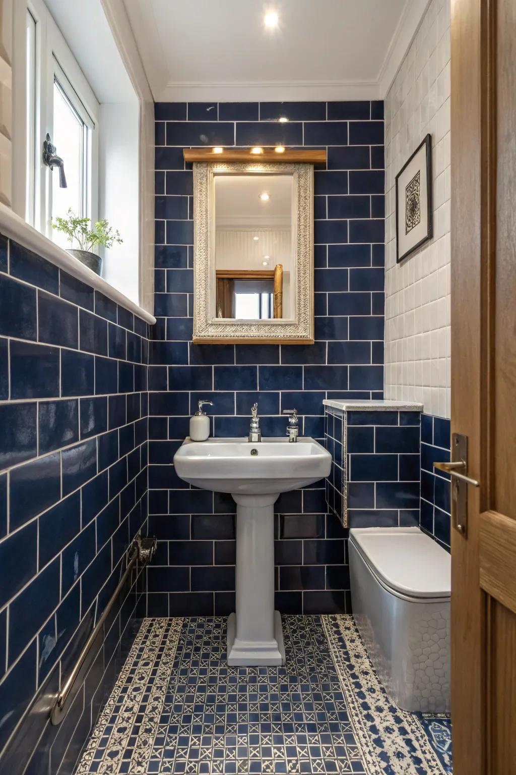 Deep blue tiles establish a dramatic yet sophisticated ambiance within this petite bathroom.
