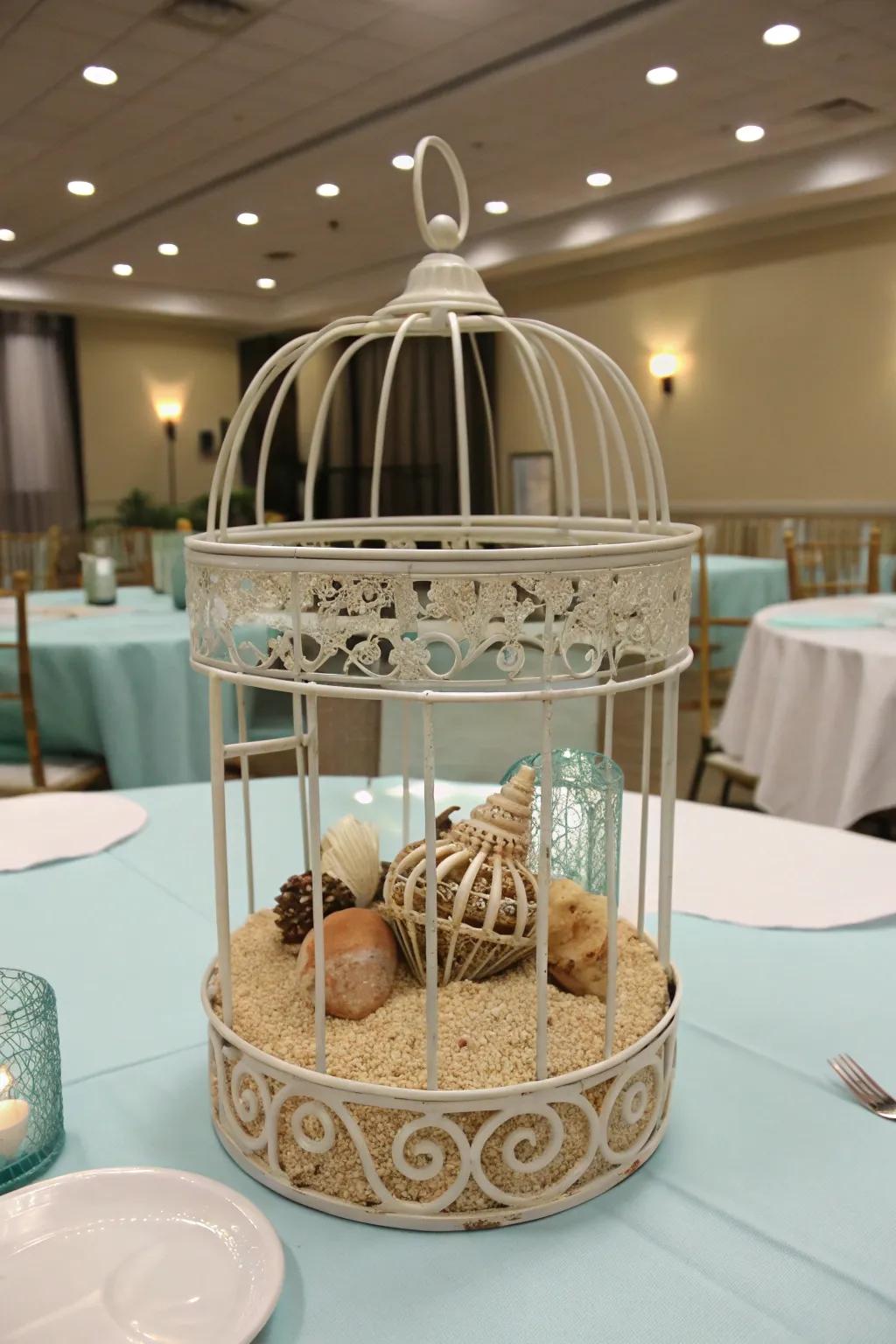 A coastal-themed <strong><em>bird enclosure</em></strong> centerpiece that integrates beach-inspired components.” loading=”lazy” class=”pimg”>
	</picture><figcaption>A coastal-themed <strong><em>bird enclosure</em></strong> centerpiece that integrates beach-inspired components.</figcaption></figure>
<p>Fill the <strong><em>bird enclosure</em></strong> with <strong>seashells and sand</strong> for a coastal-inspired centerpiece. This concept brings a touch of the beach to your table, ideally suited for summer gatherings.</p>
<h3>Some handy options:</h3>
<ul class=