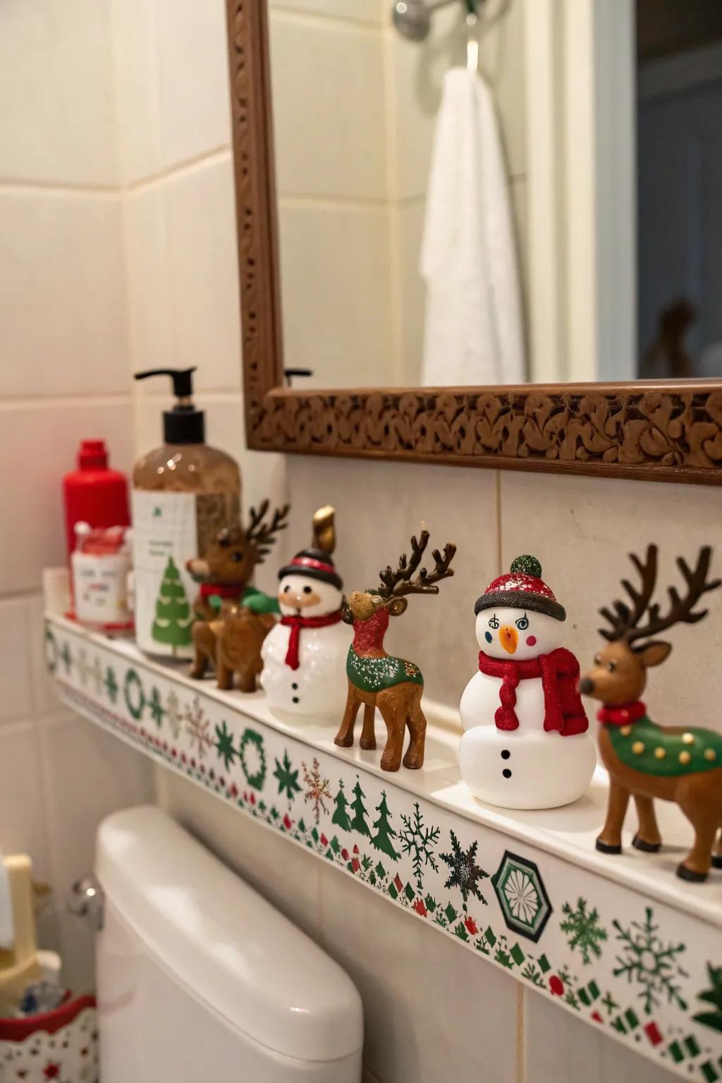 Christmas figurines add a whimsical touch to your bathroom decor.