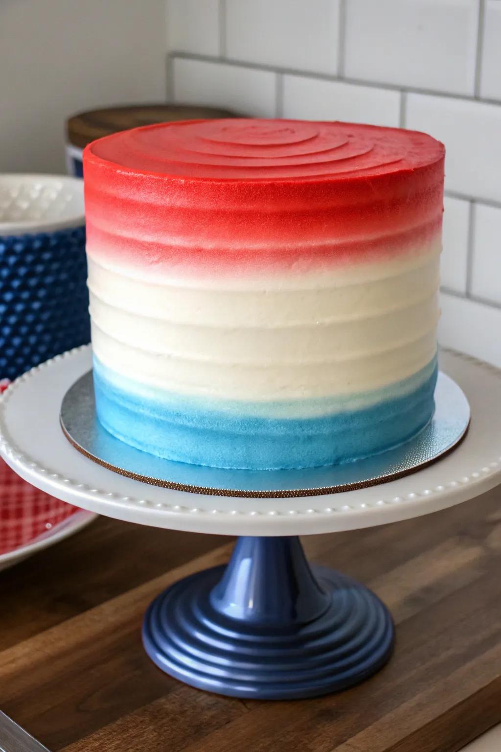 An ombre cake blends patriotic colors seamlessly, producing a striking visual.