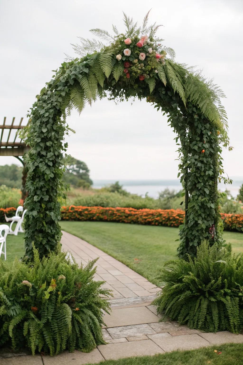 An arch enveloped in verdant decor, which offers a lavish and natural vibe.