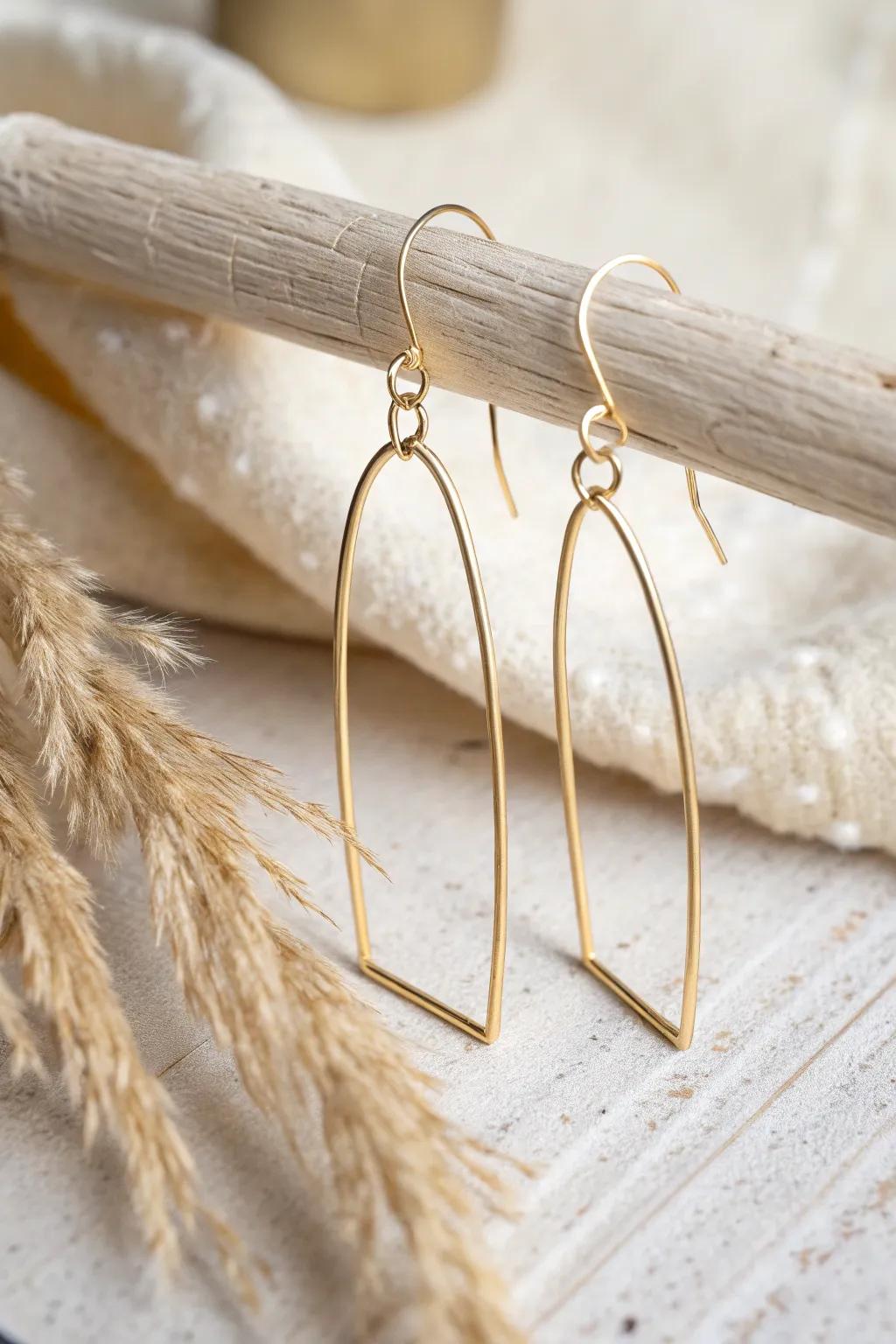 Delight in minimalist elegance with these sleek wire bar earrings – a wonderful mix of simplicity and style.