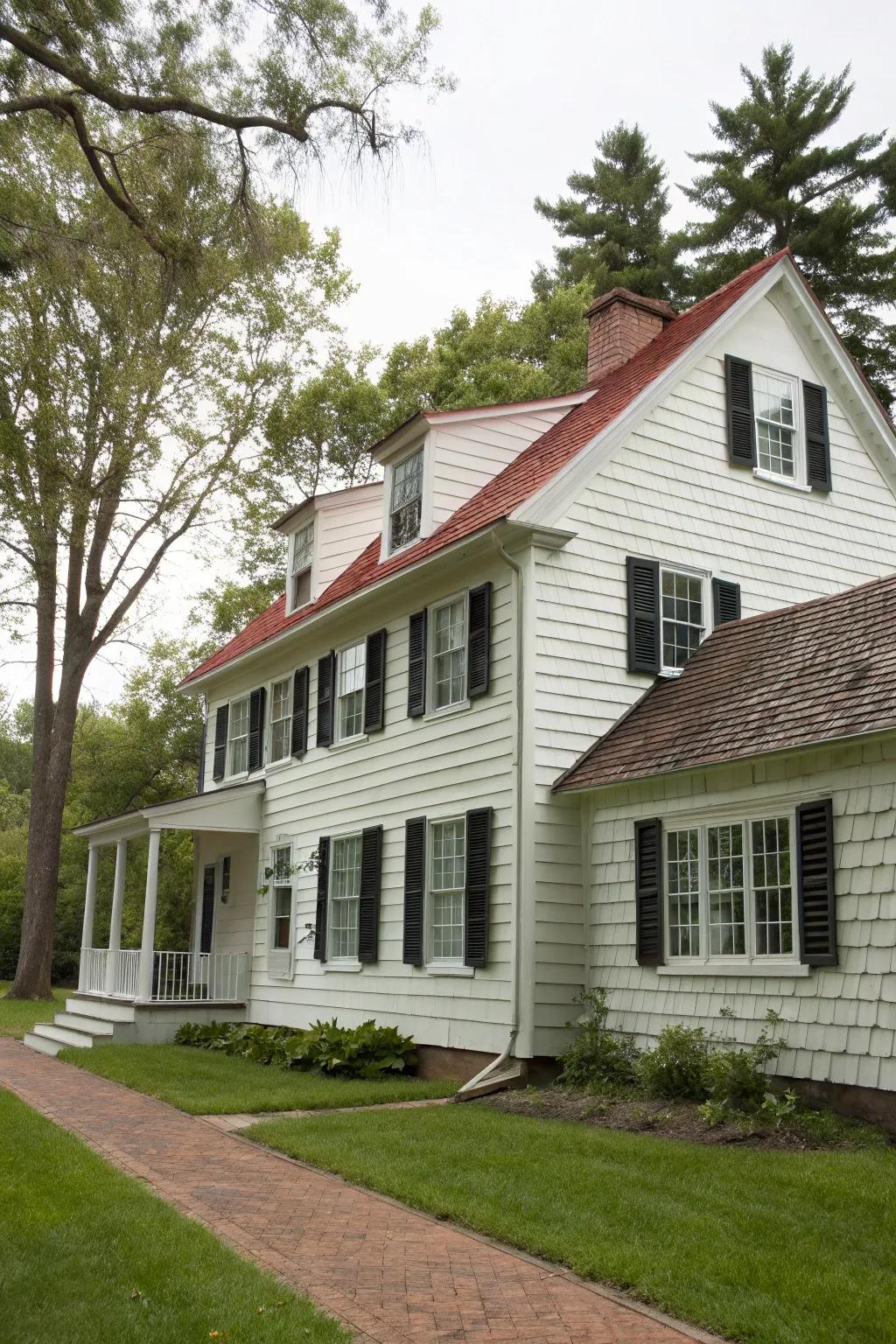 Colonial-style home featuring textured shake siding.