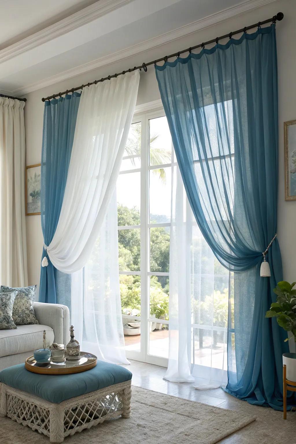 Layering sky-hue drapes with white airiness crafts a light and airy ambiance, offering versatile illumination control.