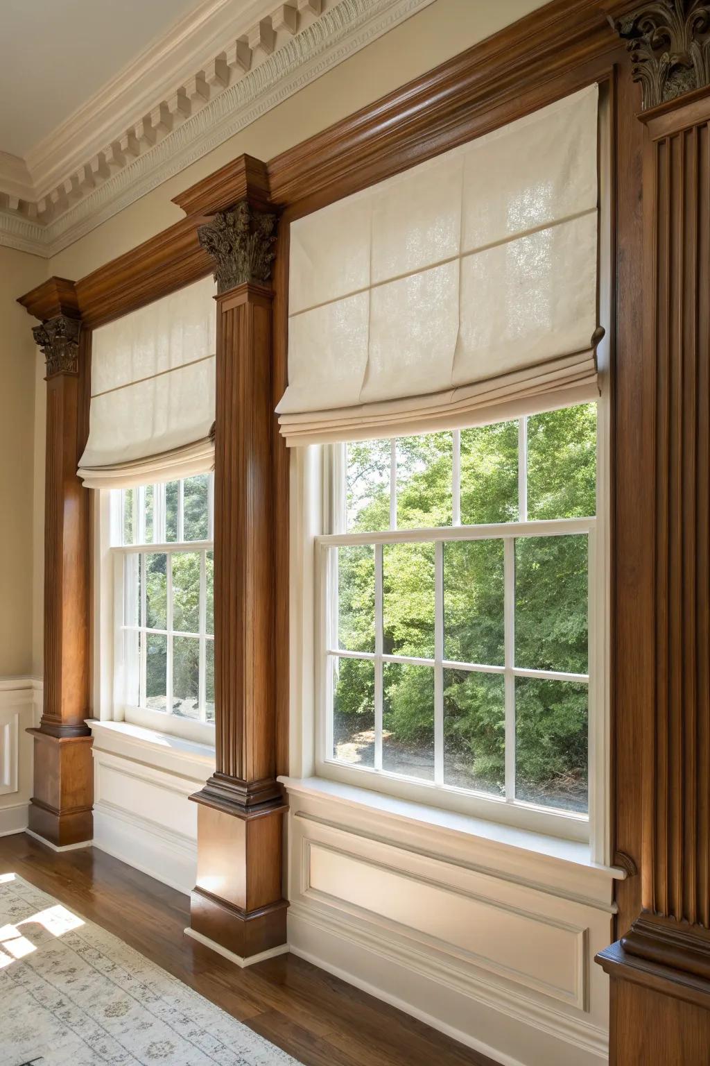 Traditional home with elegant Roman shades that dress a picture window.