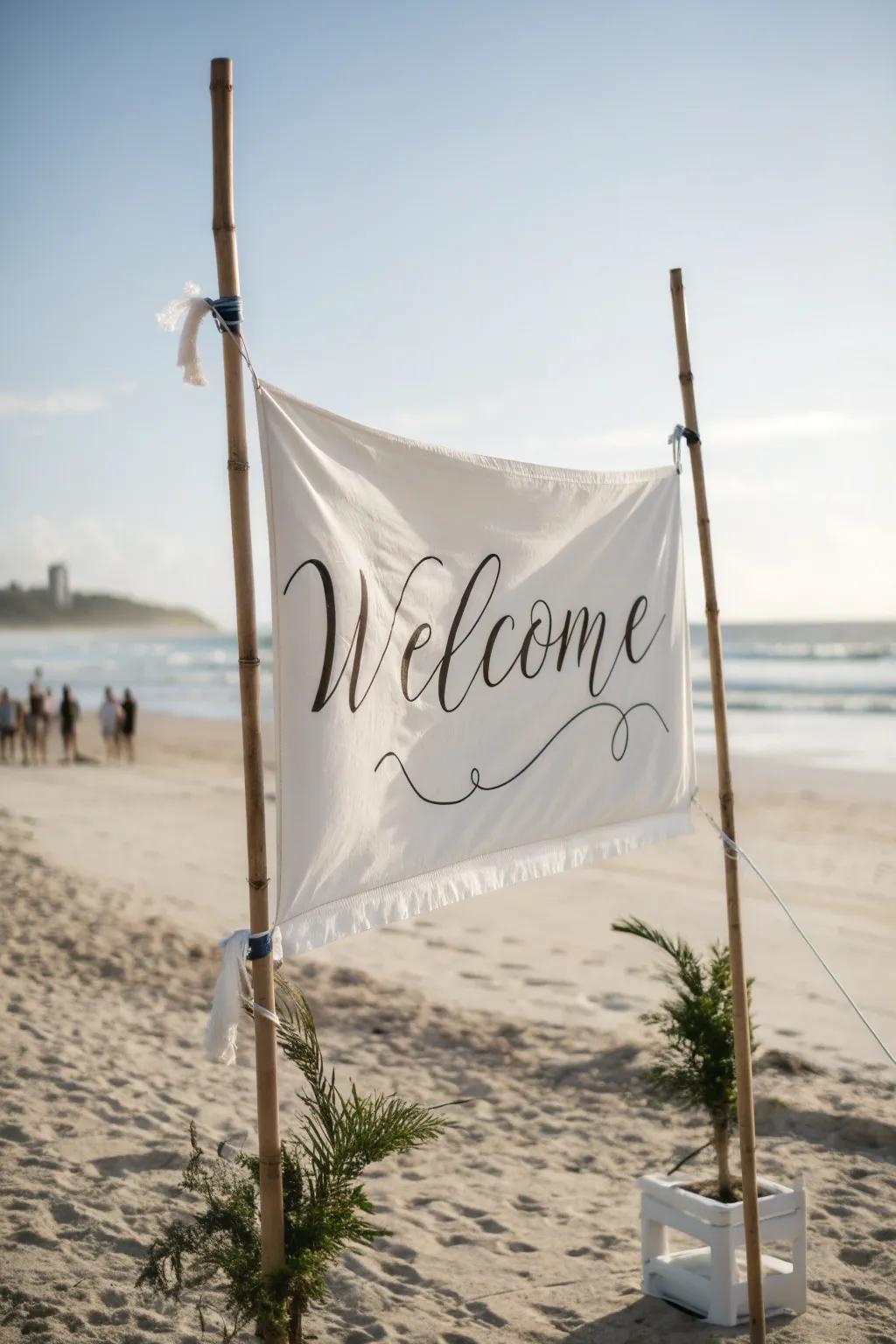 A soft fabric banner welcome sign, perfect for creating a romantic atmosphere at a beach wedding.
