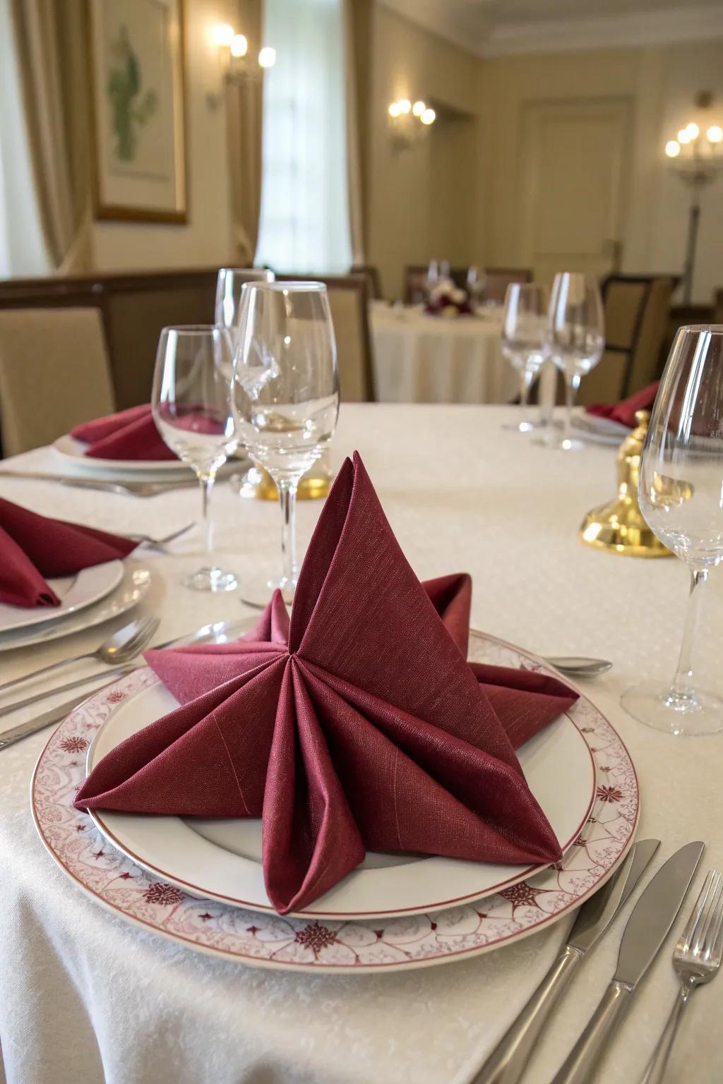 The octagonal star napkin fold, a dazzling centerpiece.
