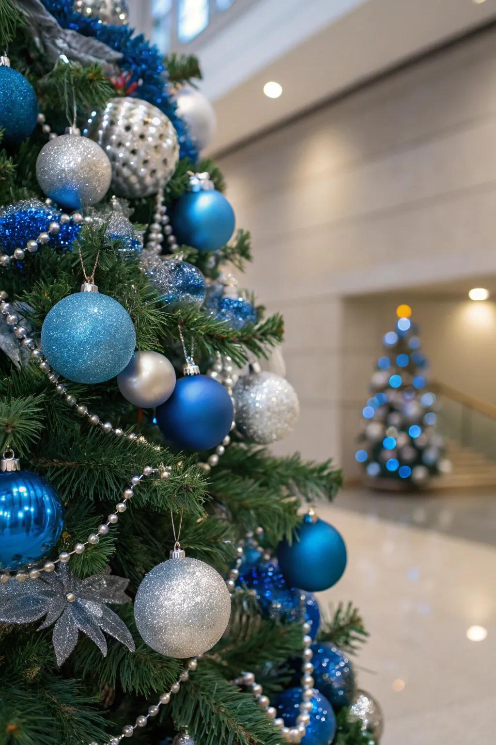 A single-color Christmas tree with a blue and silver theme.