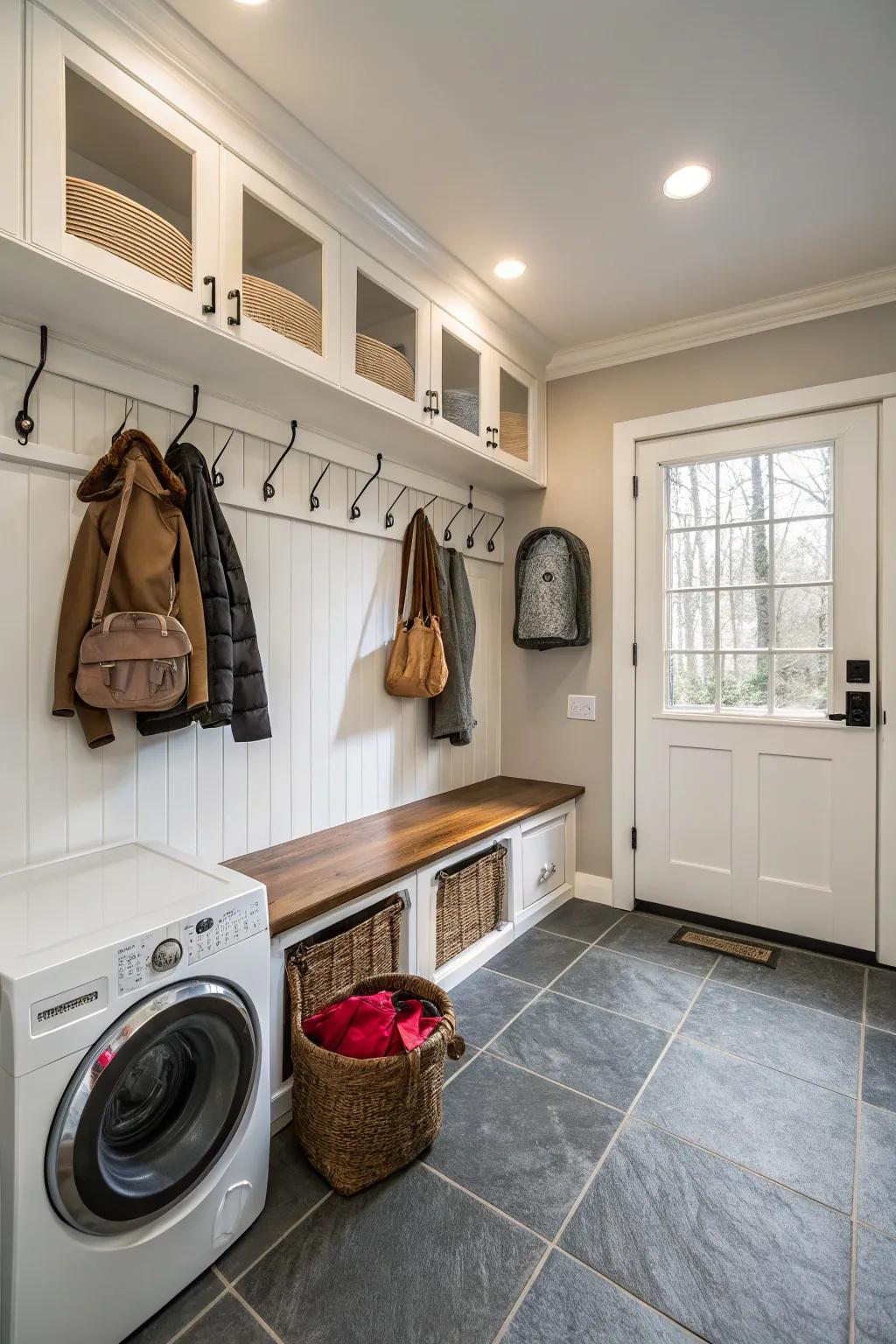 A mud room that serves as a laundry space.