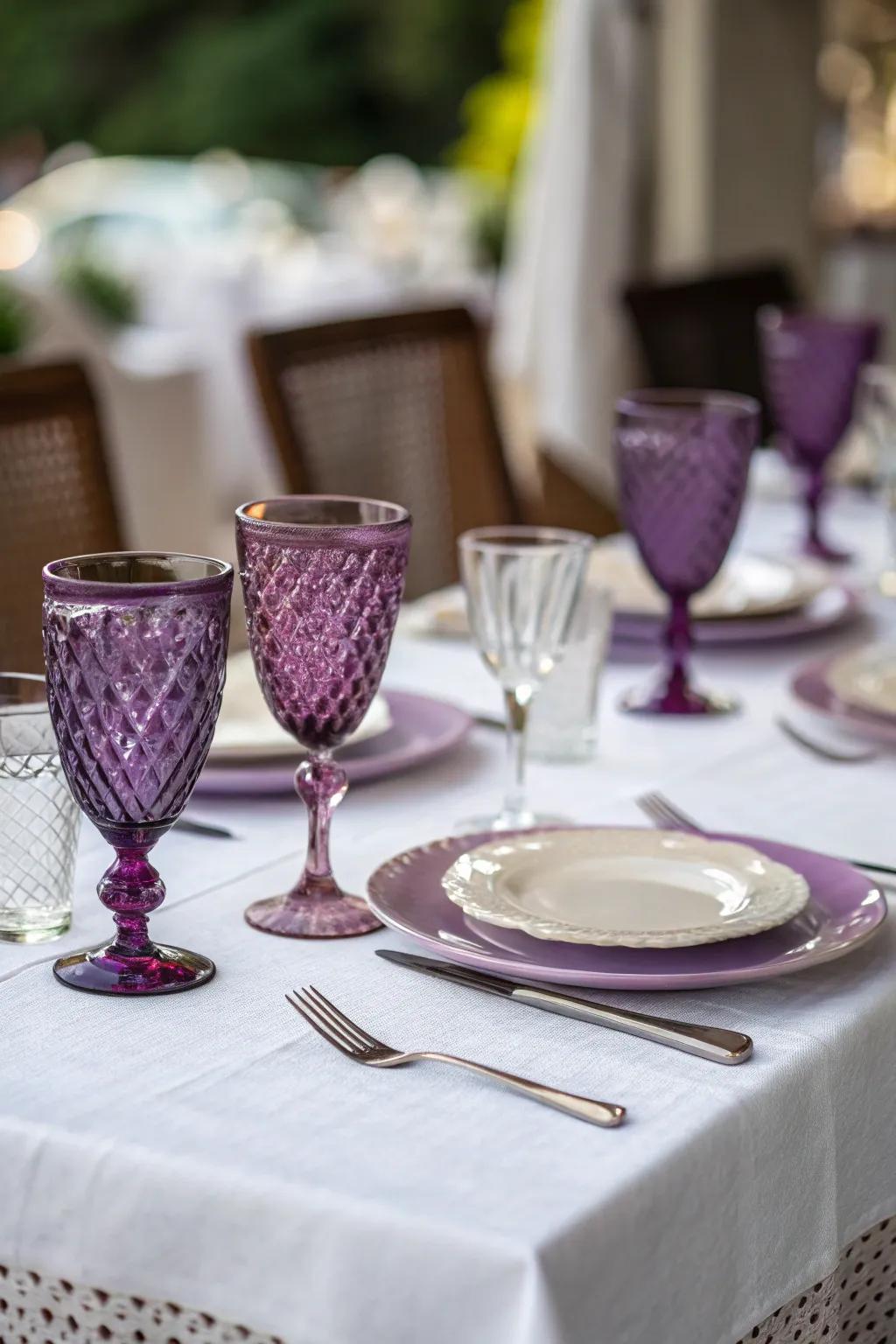 Purple tinted glassware adds a whimsical touch to any table setting.