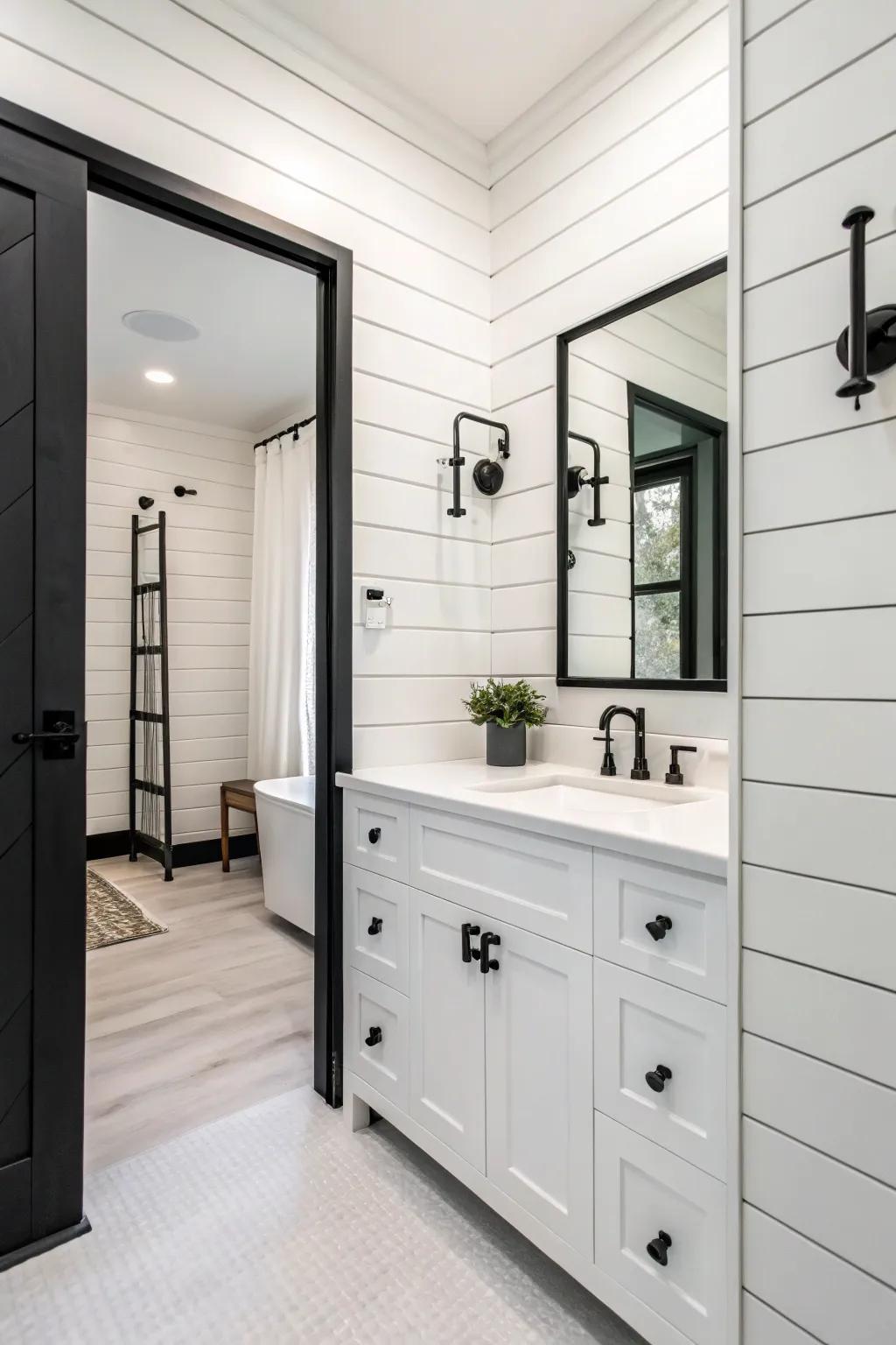 A monochrome bathroom featuring bright plank cladding for a textured aesthetic.