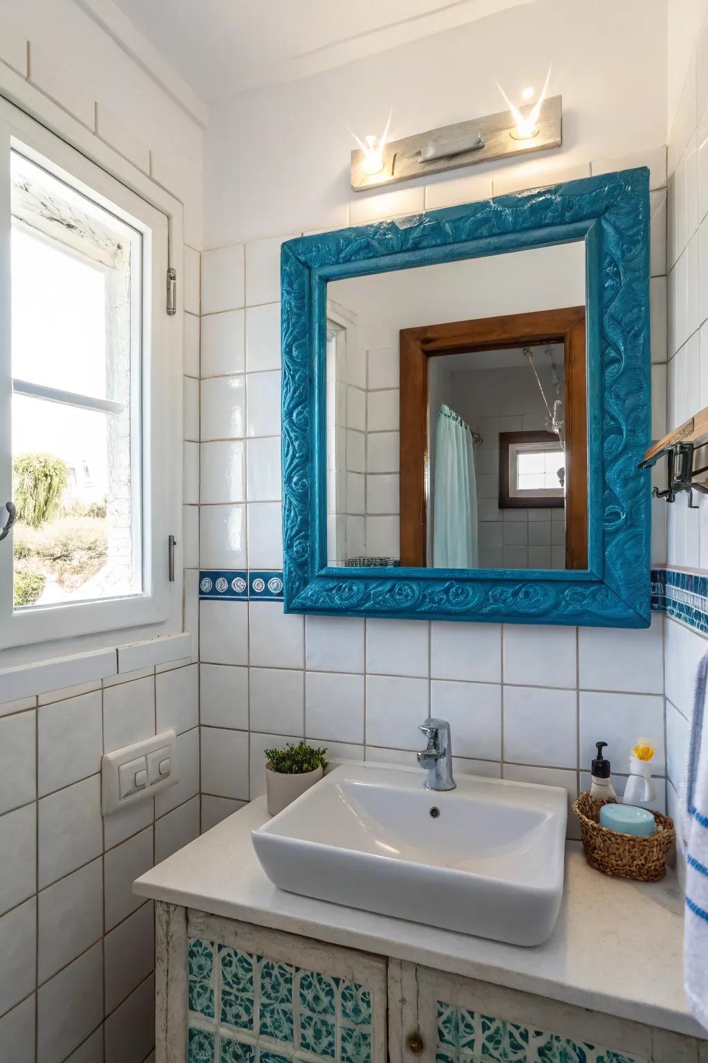 A blue mirror displaying a distinctive frame injects character and aesthetic into the bathroom.