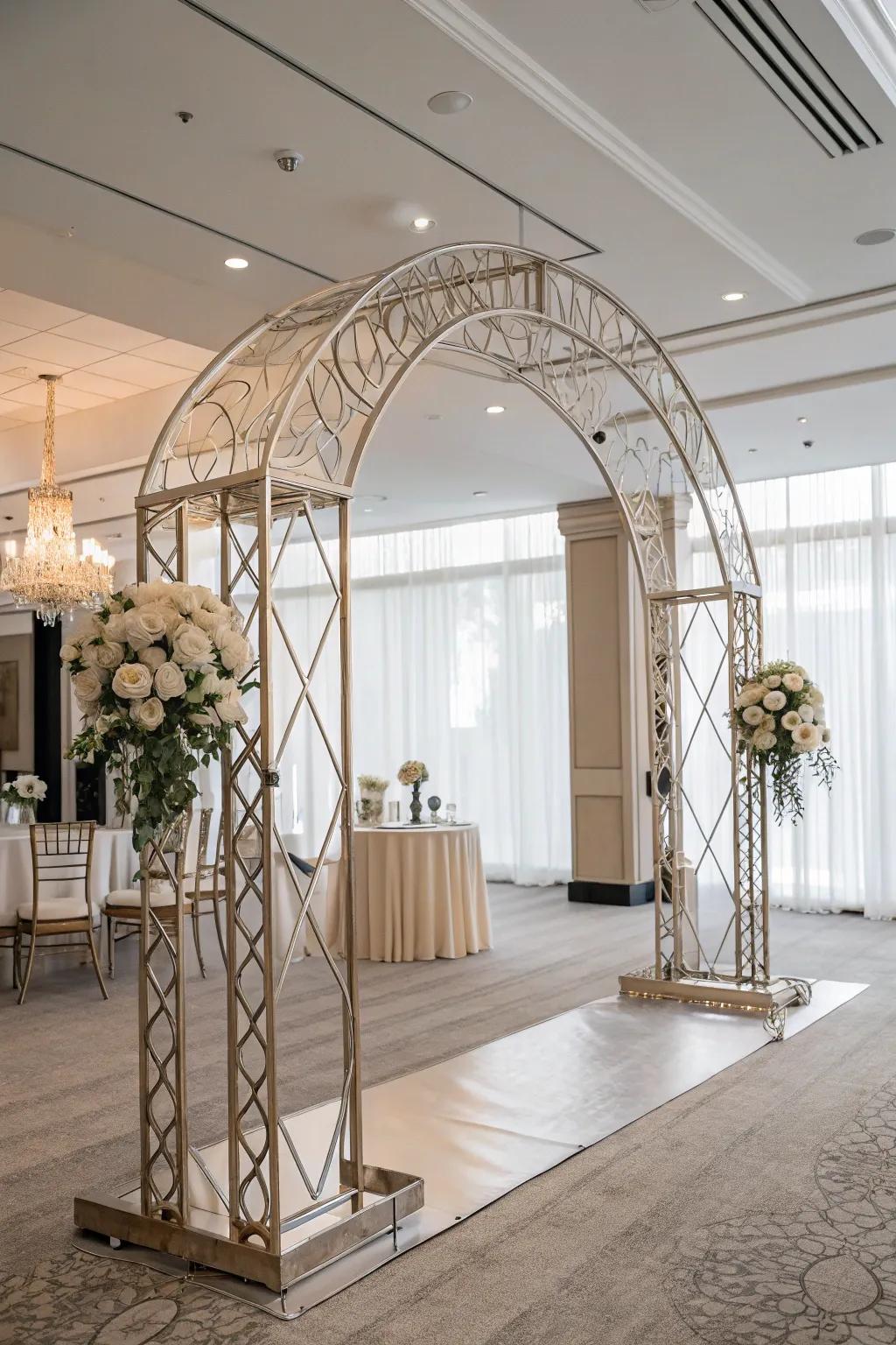 Polished embellishments introduce contemporary sophistication to an indoor wedding arch.