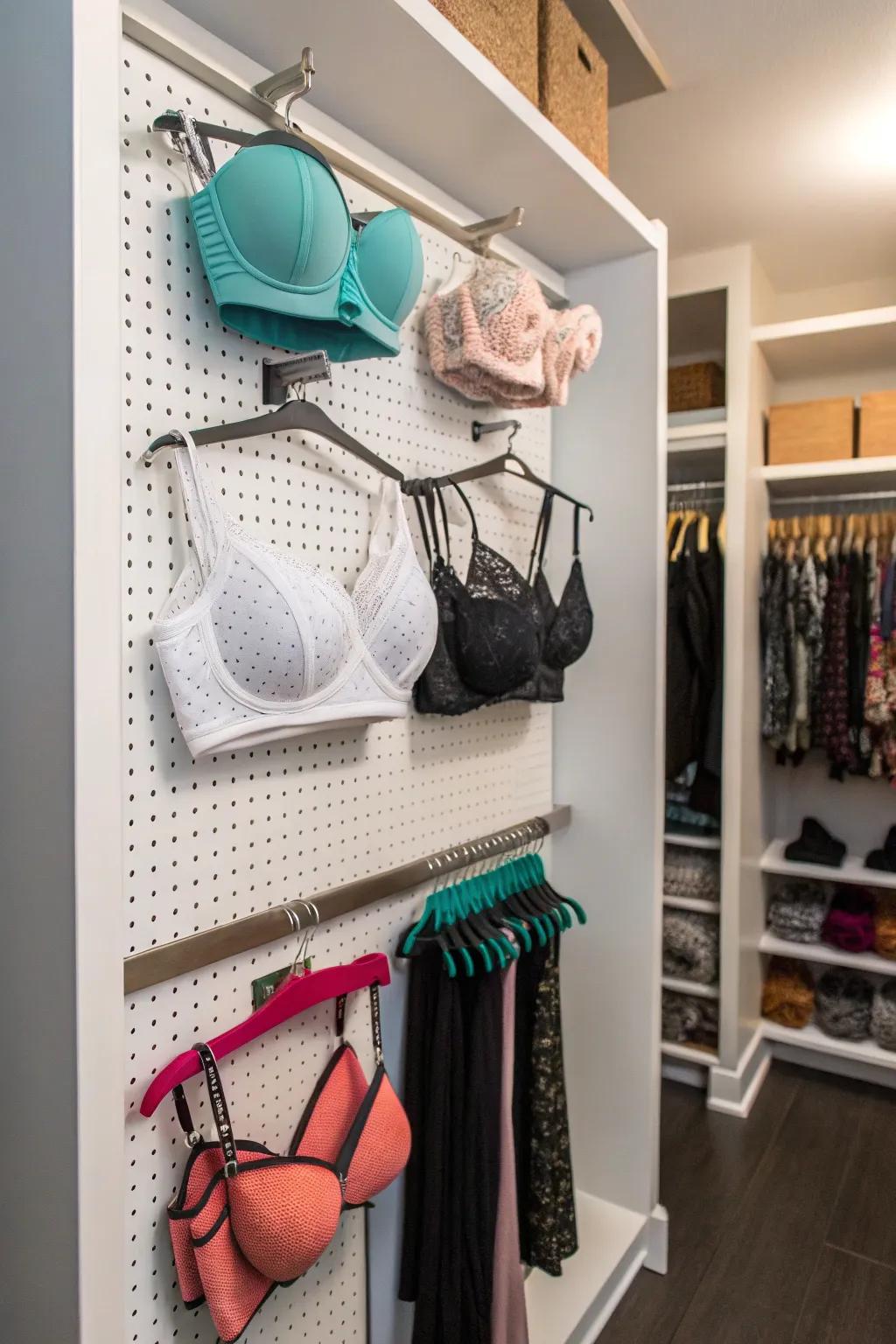 Get creative with a pegboard for flexible bra storage.