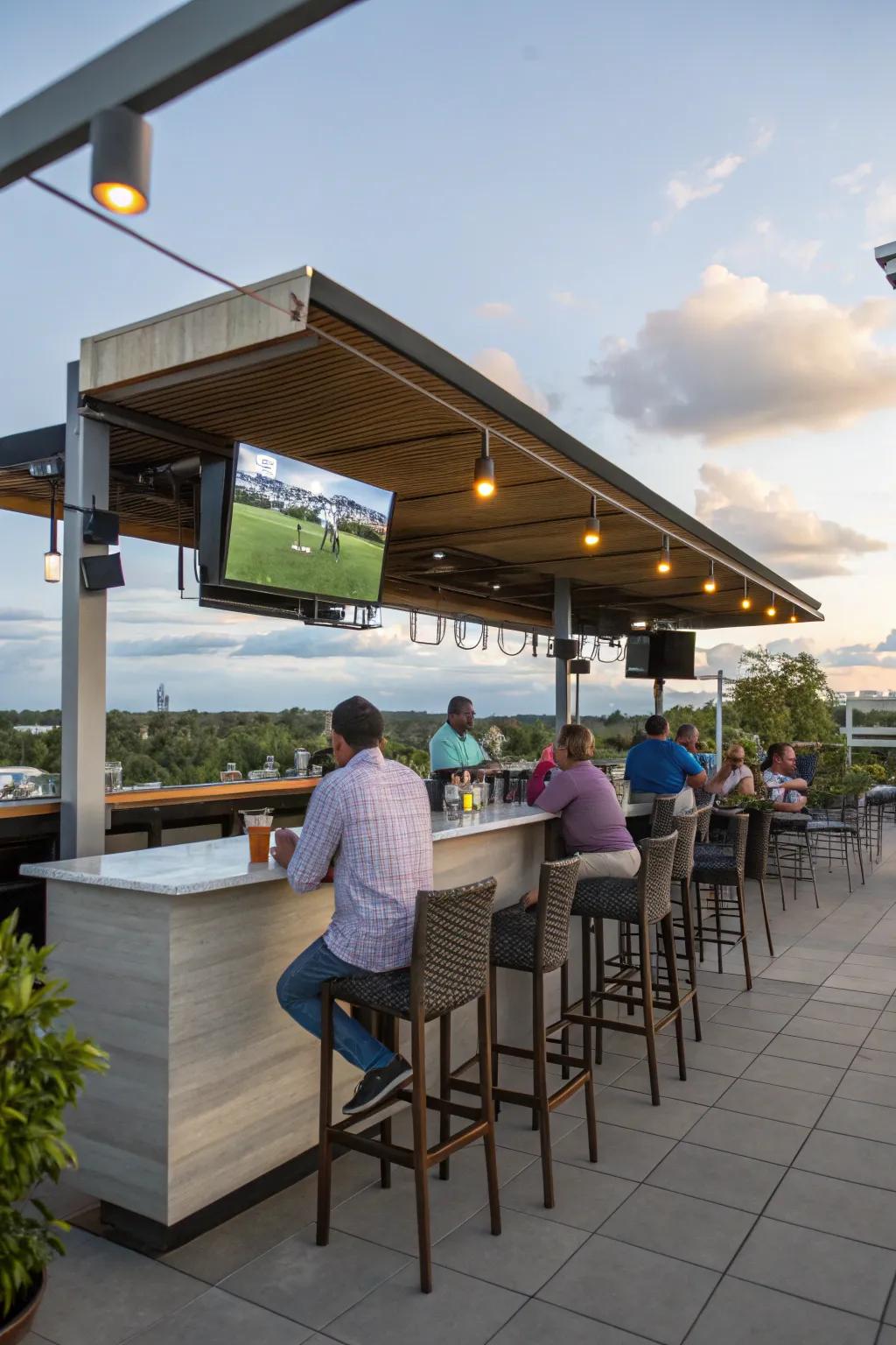 An outdoor bar with a TV creates a perfect party atmosphere.