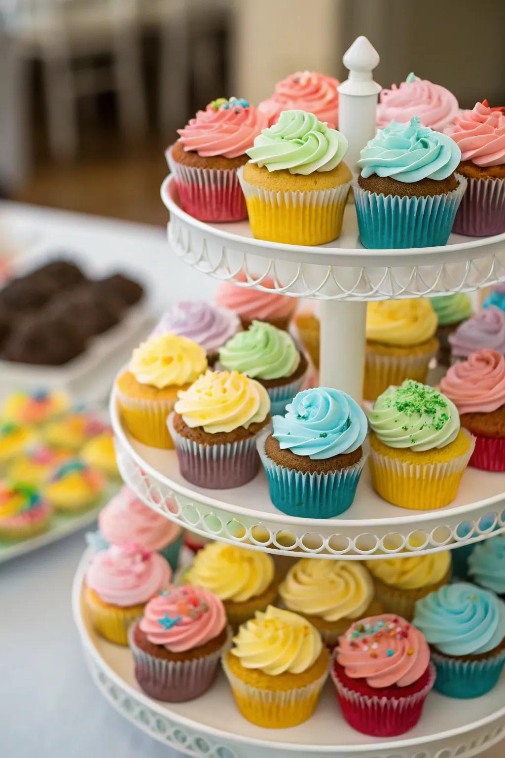 A towering display of cupcakes adding height and color to the party.