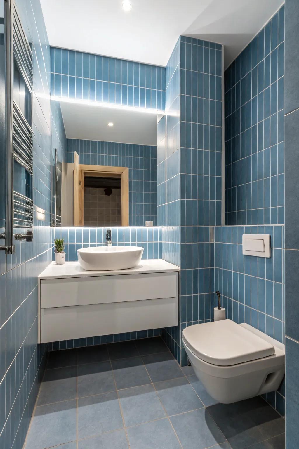 Minimalist azure tiles fashion a polished and contemporary bathroom aesthetic.
