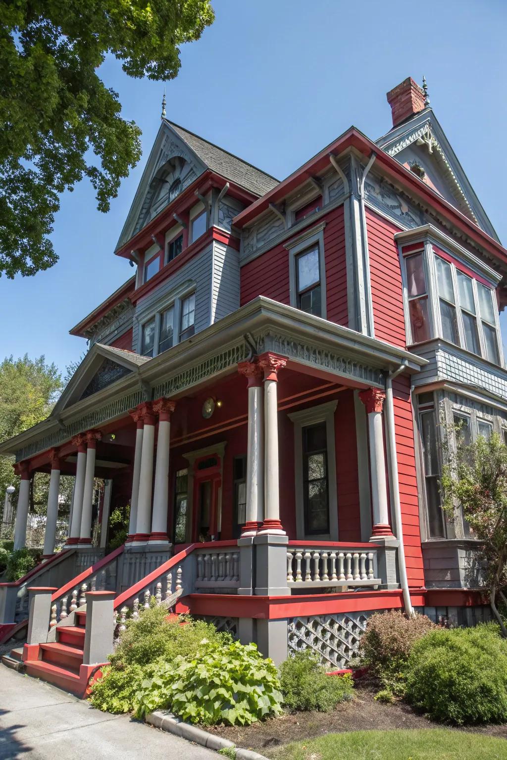 Colonial home featuring bold scarlet and grey hues.