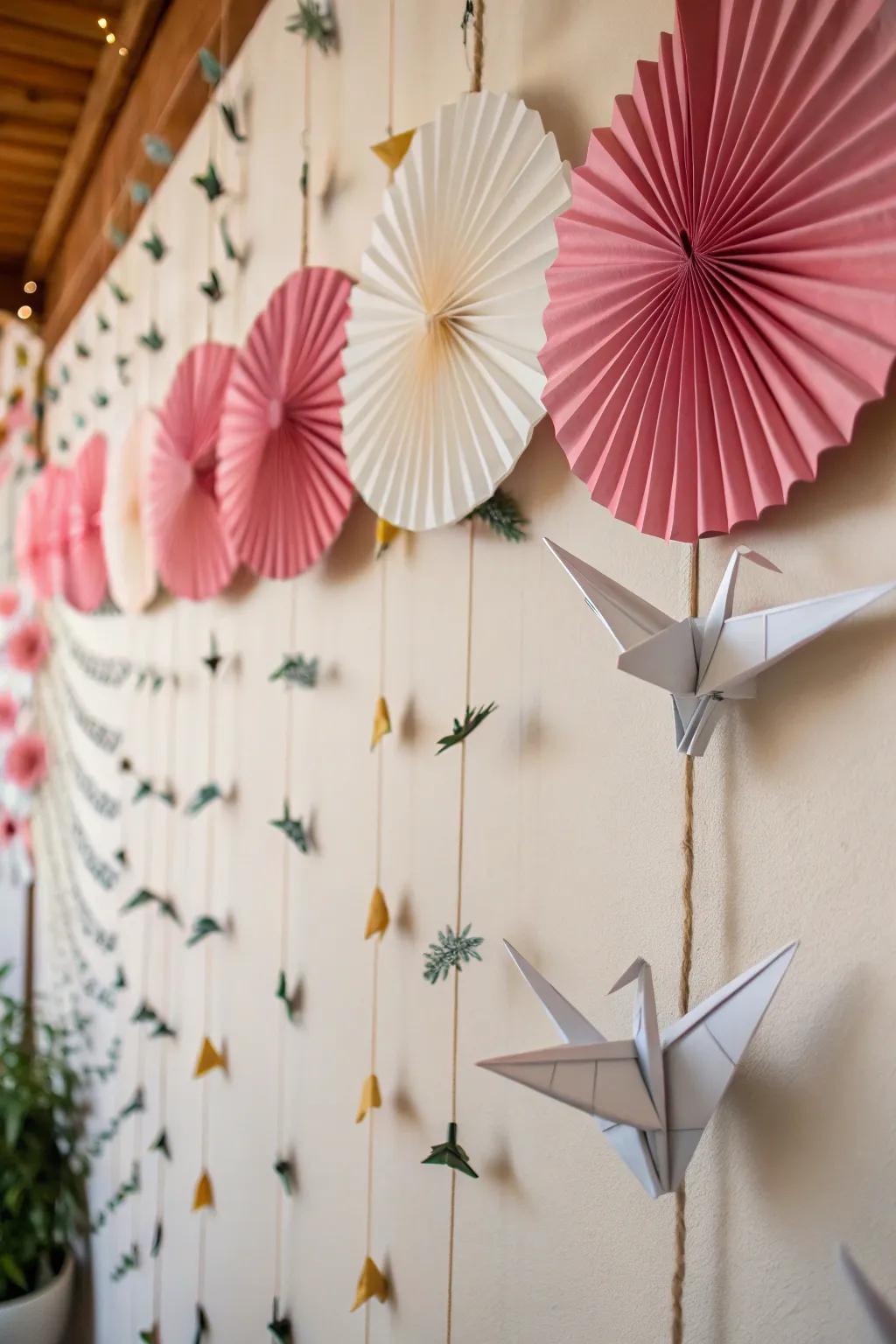A backdrop decorated with paper cranes and fans, introducing a whimsical and enchanting element.