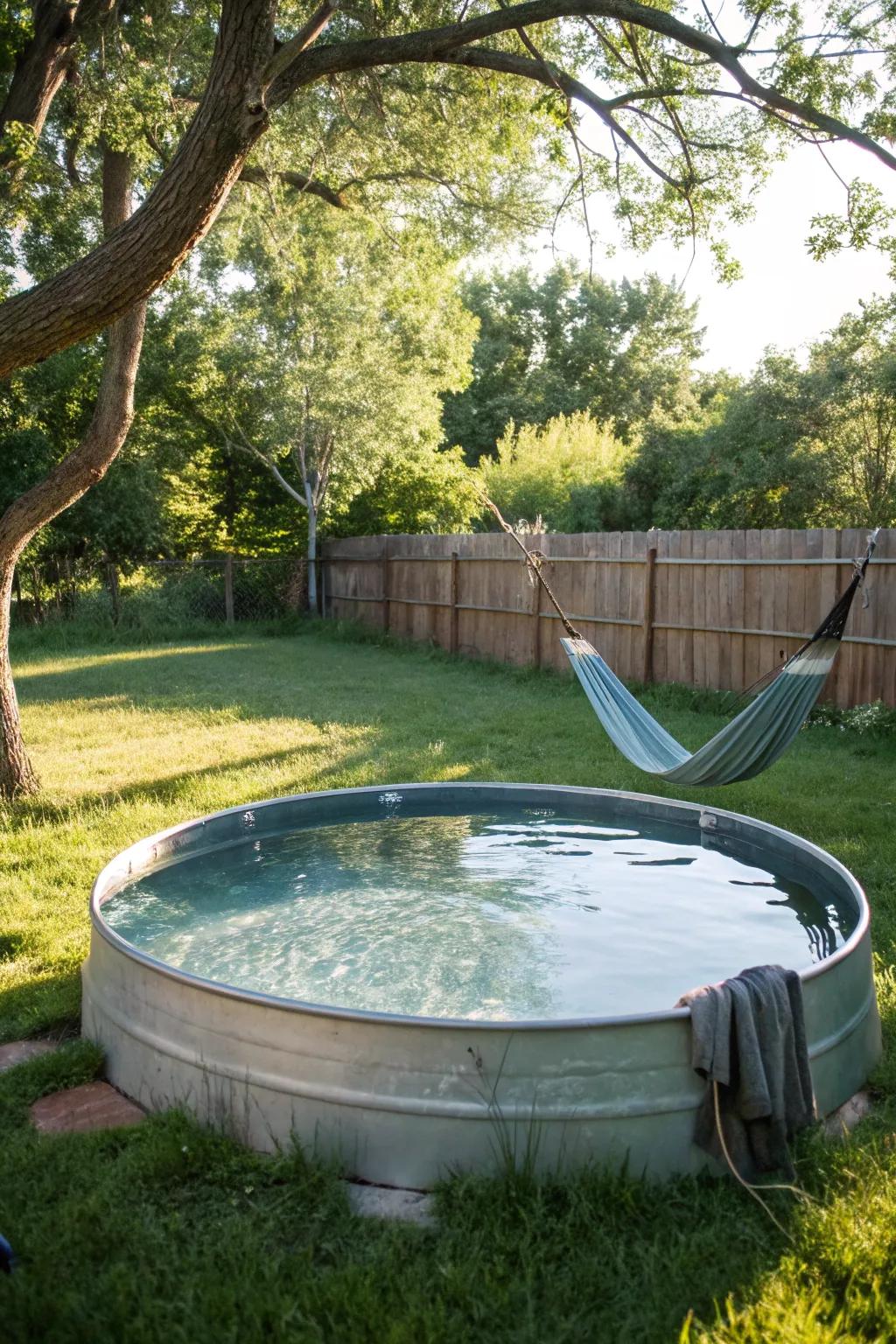 A hammock enhances the leisurely vibes within a water trough pool area.