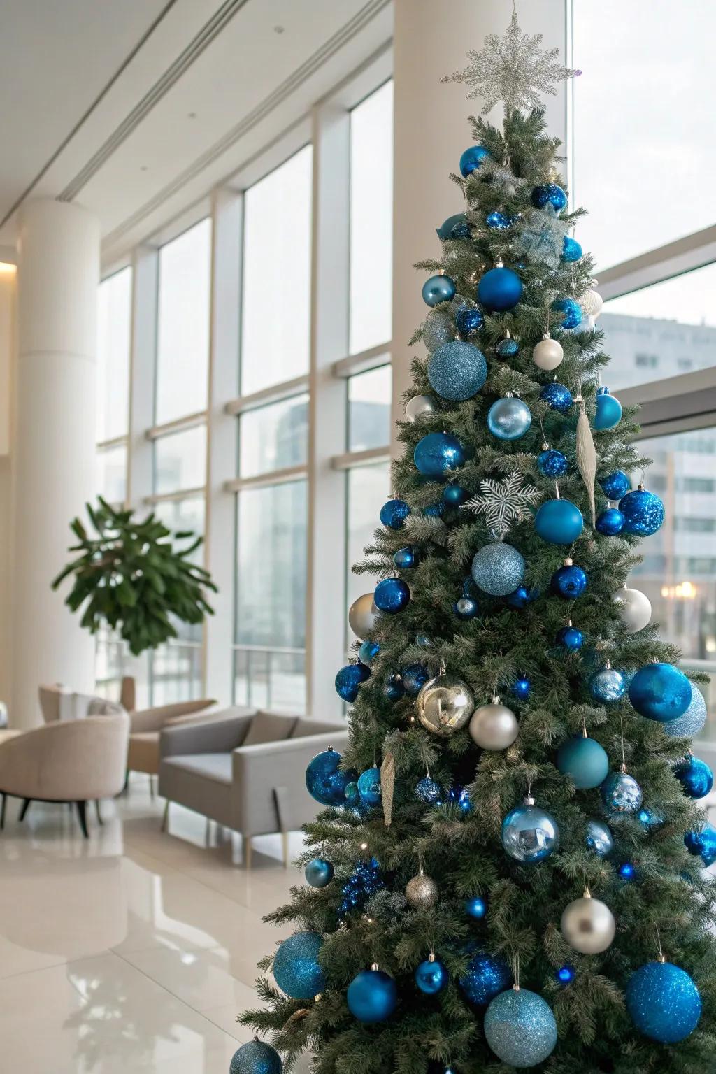 A sleek and modern blue and metallic Christmas tree.