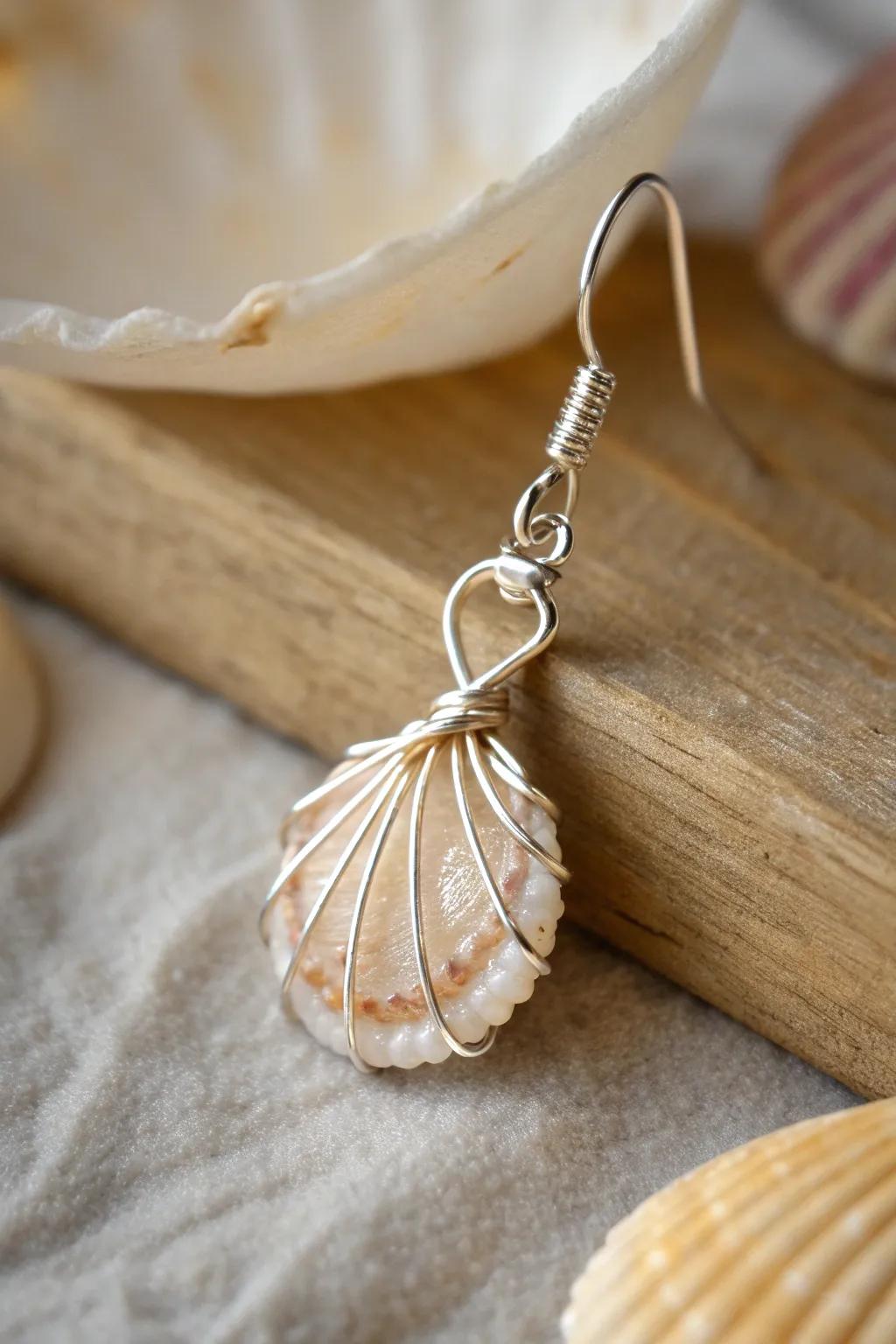 Welcome the sea's elegance with hand-made wire-framed shell earrings—perfect for a fashionable summer look.