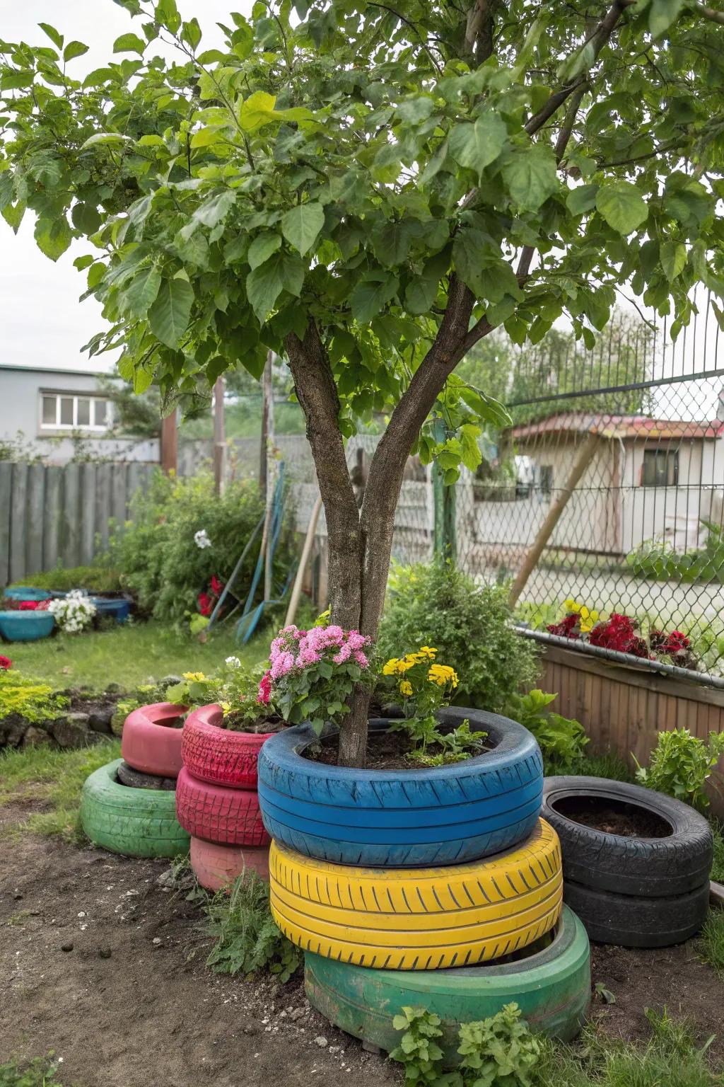 Innovative tire planters providing support for tree growth.