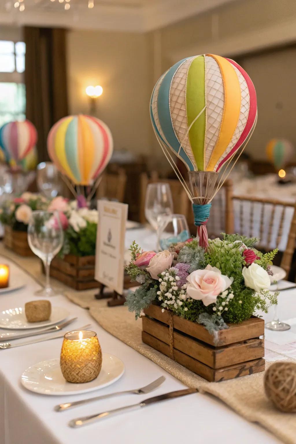 Petite hot air balloon models identifying each guest’s chair.