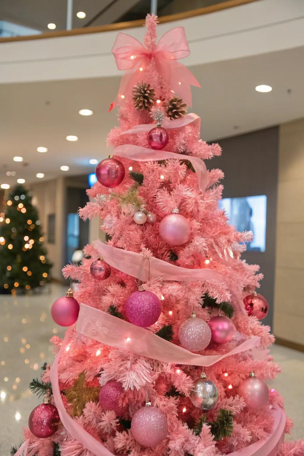 Seasonal decorations maintain a fresh and versatile look for this pink tree.