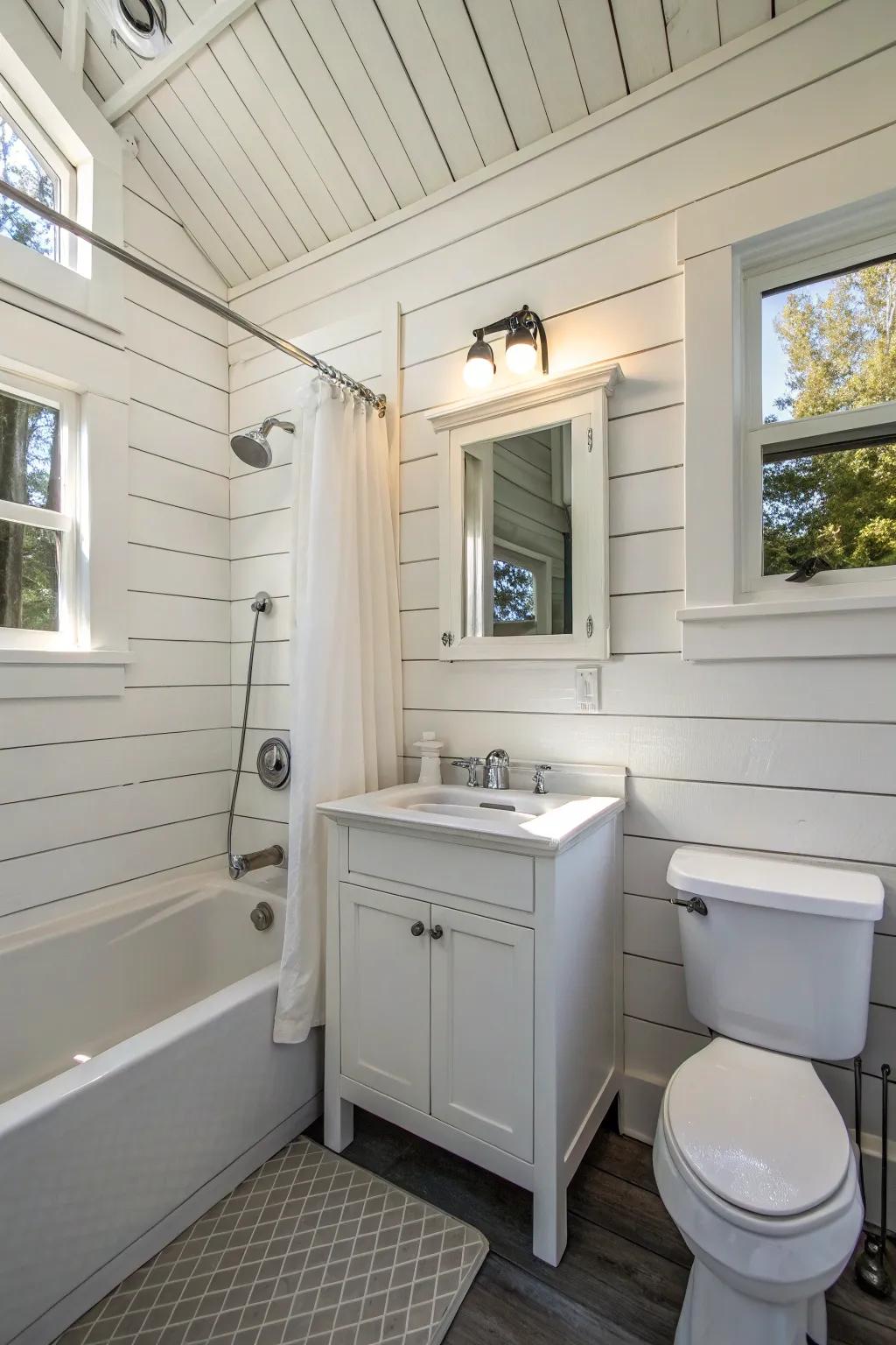 A small bathroom featuring bright plank cladding for added charm.