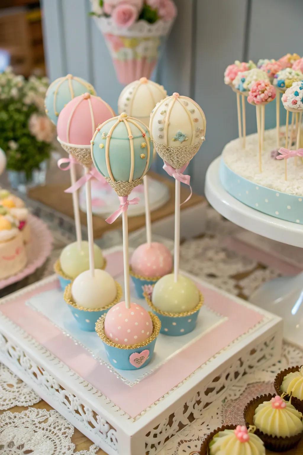 Appetizing pastry lollipops resembling mini hot air balloons.