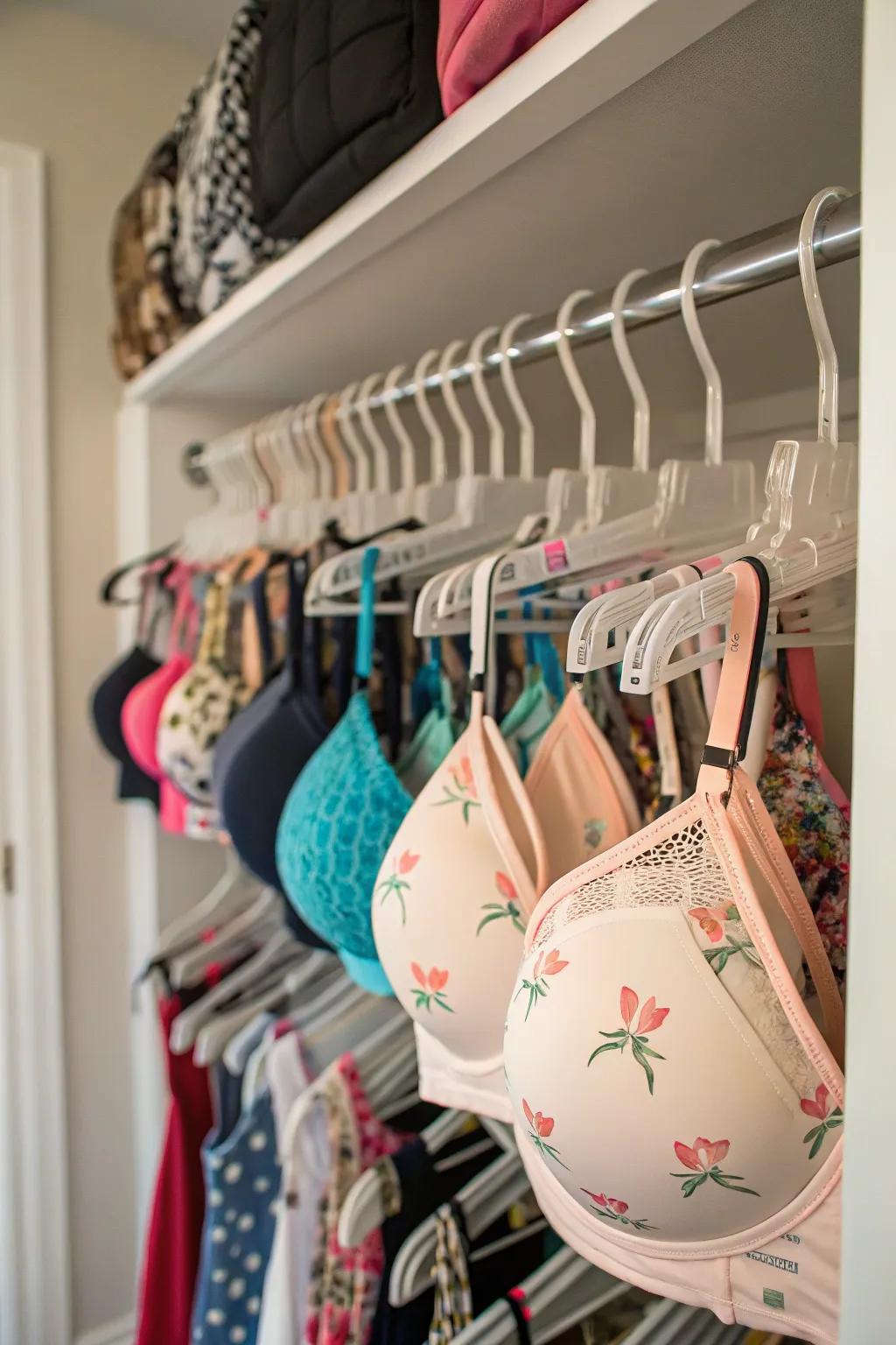 Maintain the shape of your bras by suspending them on hangers with multiple clips.
