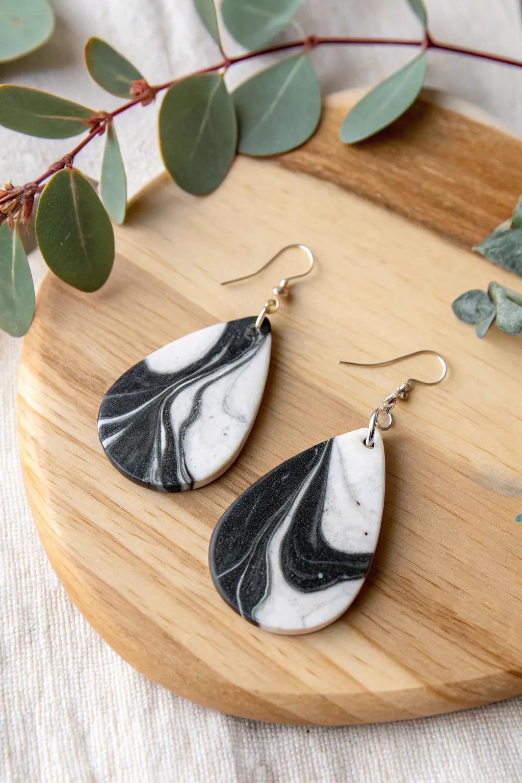 Elevate your style with the timeless elegance of stone-effect clay earrings. Handcrafted simplicity at its finest.