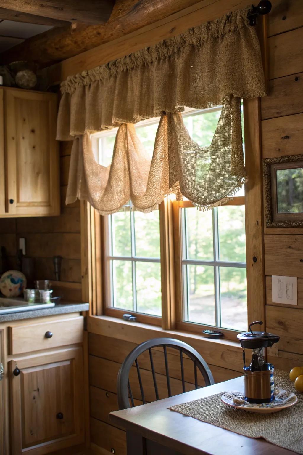 A welcoming culinary space showcasing a hessian valance that harmonizes with the unrefined timber components of the setting.