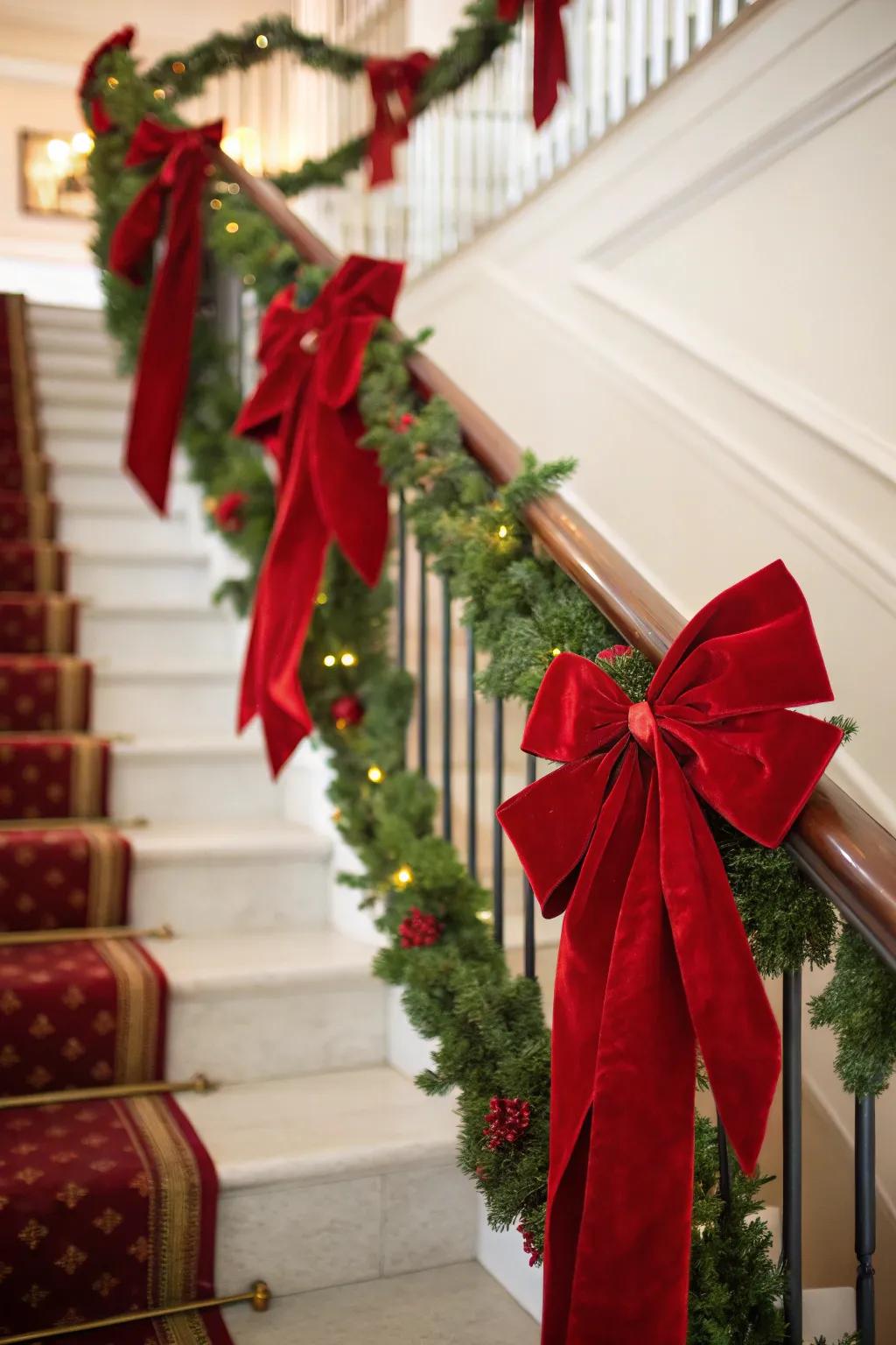Stairway embellished with crimson felt ribbons and bows.