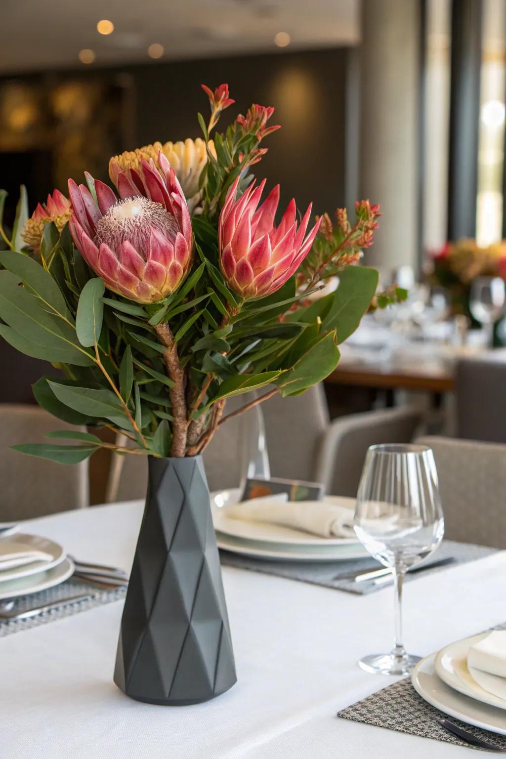 Audacious protea centerpiece creating a striking impact.