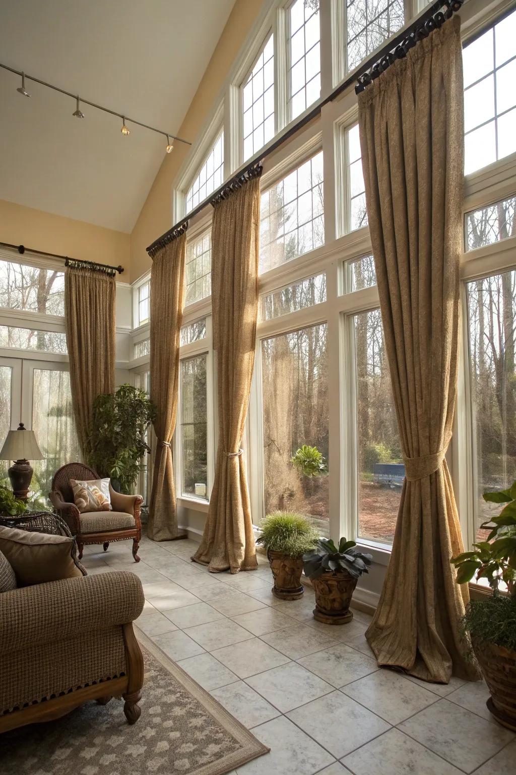 Floor-length curtains make your sunroom feel grand.