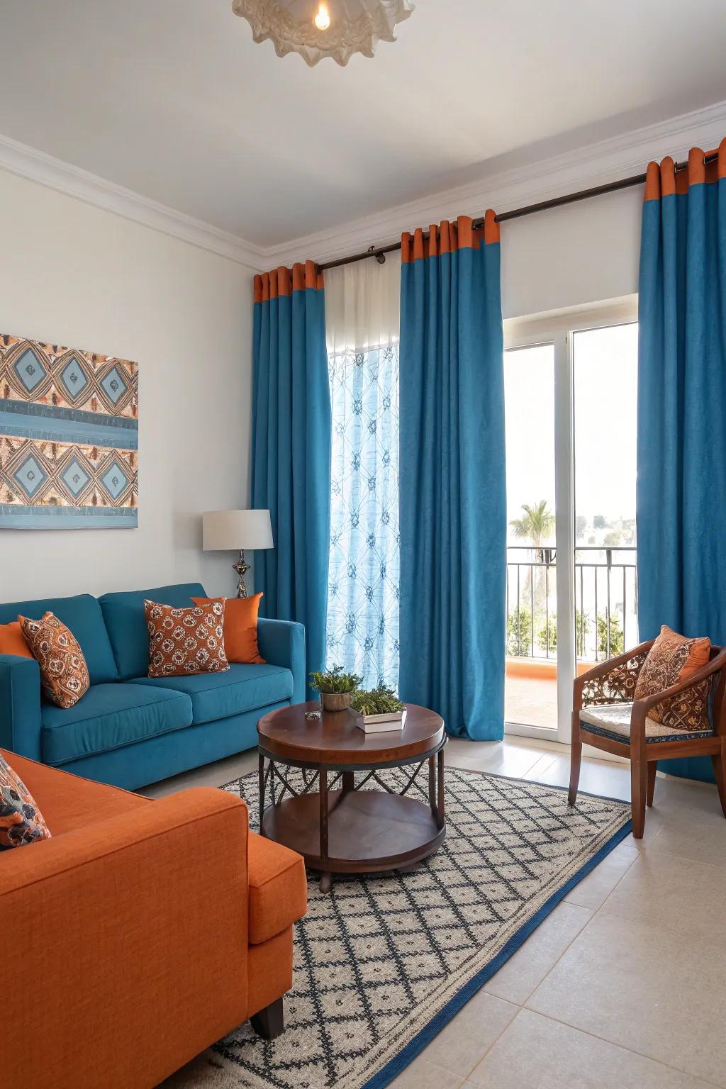 Striking citrus highlights create a lively contrast against the serene sky-hue drapes, invigorating the area.
