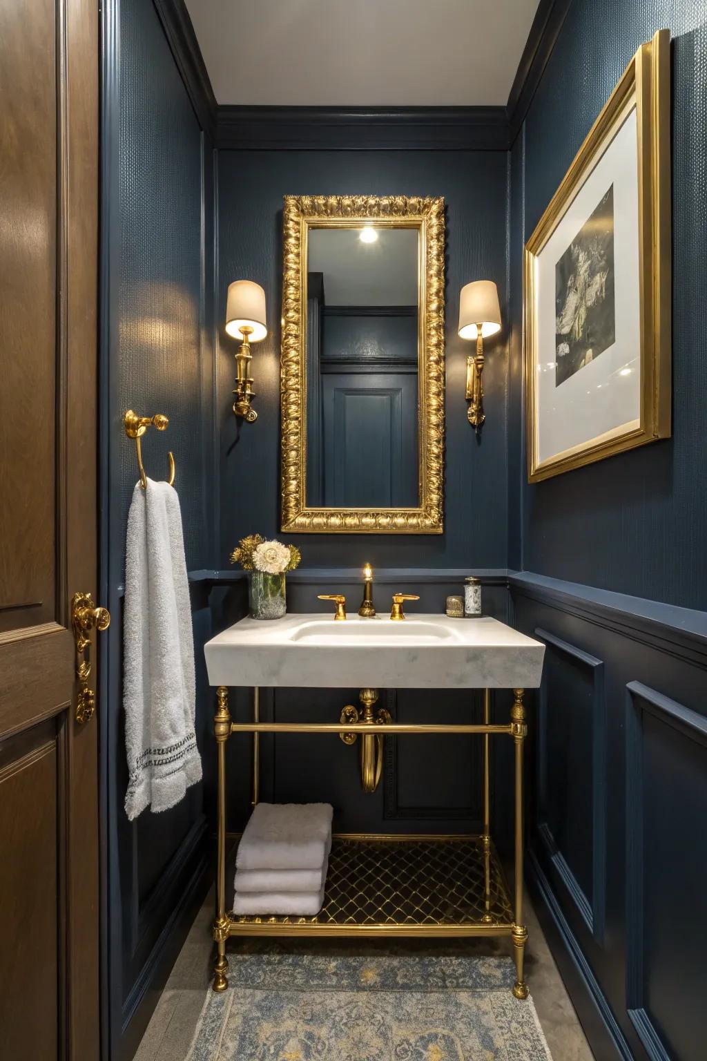 Gilded details impart a sense of opulence to the deep blue bathroom.