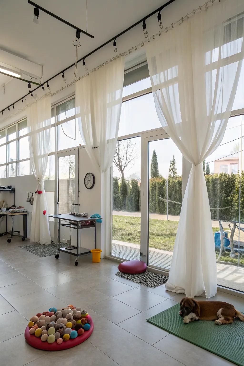 Enhanced natural light using expansive windows and ethereal sheer curtains.