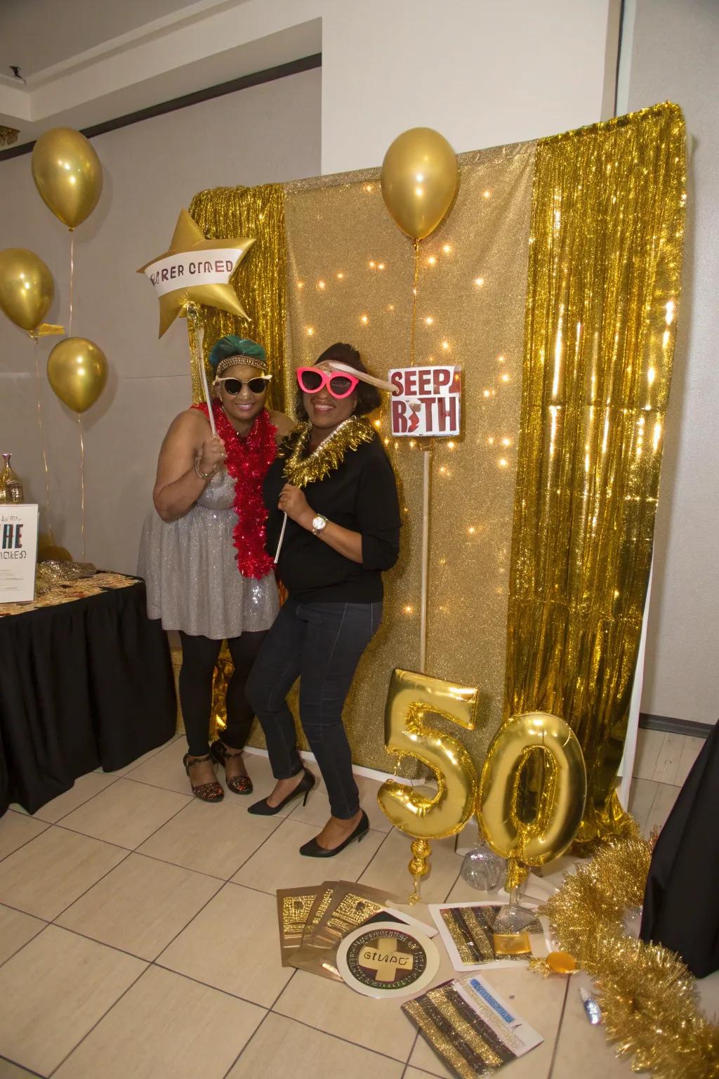 A gilded-themed photo booth captures lively and fun memories for all guests.